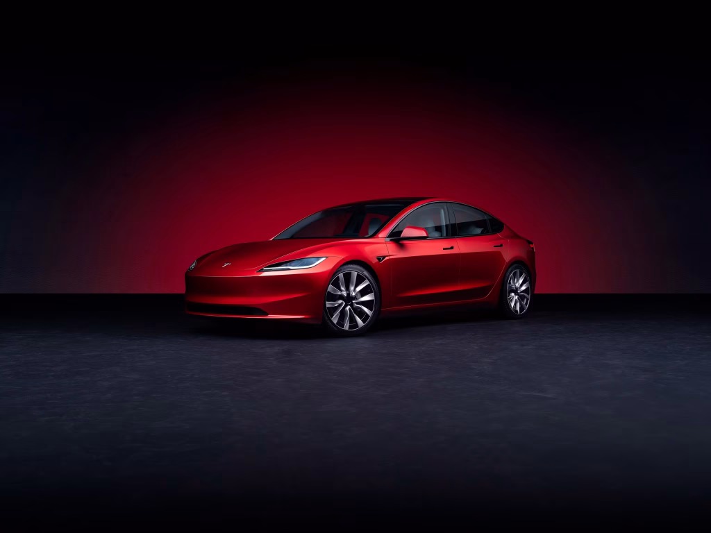 1218165 | Wagner Certified Collision Red sports car shown from a low front-side angle against a dark gradient background with red glow.